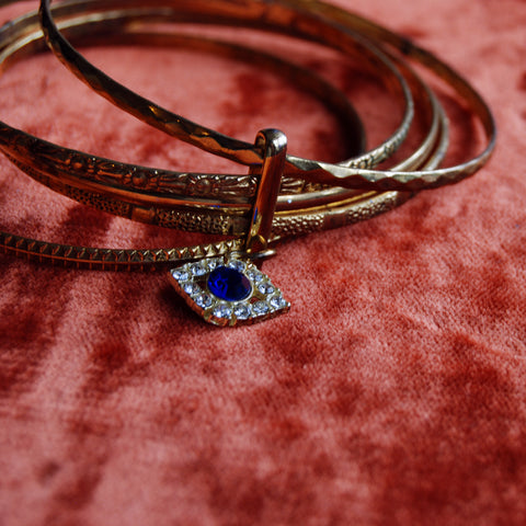 Evil Eye Gold Plated Set of Bangles with floral texture. Blue Rhinestone All Seeing Eye.