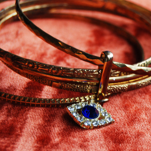 Evil Eye Gold Plated Set of Bangles with floral texture. Blue Rhinestone All Seeing Eye.