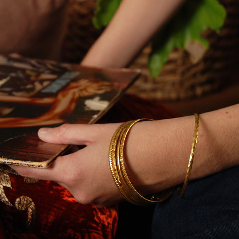 Evil Eye Gold Plated Set of Bangles with floral texture. Blue Rhinestone All Seeing Eye.