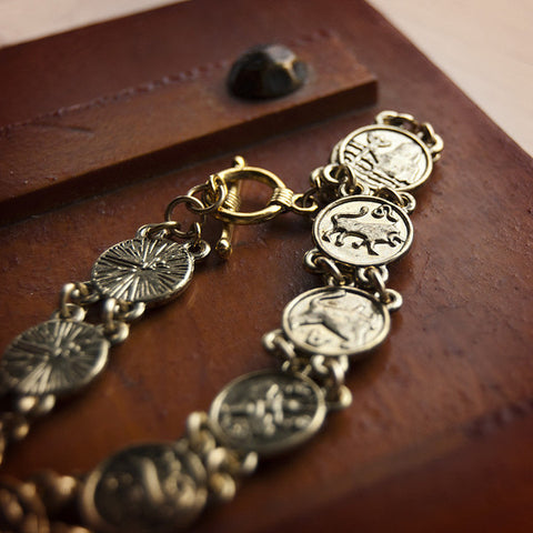 Zodiac Bracelet, Shiny Brass Astrology Signs