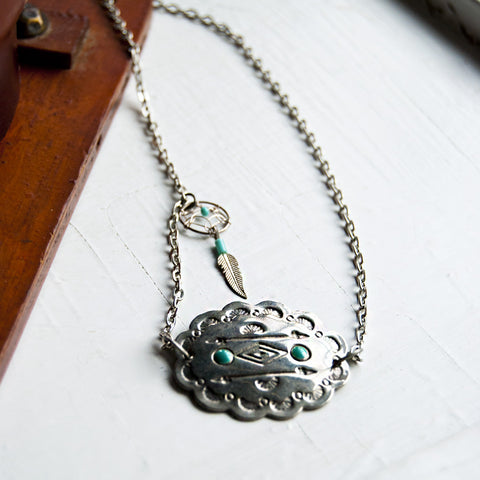 Southwestern geometric silver pendant with dreamcatcher charm. Silver Chain.
