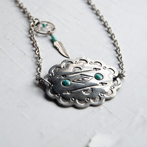 Southwestern geometric silver pendant with dreamcatcher charm. Silver Chain.