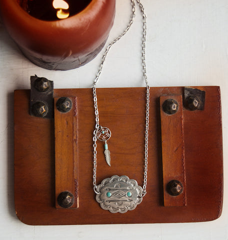 Southwestern geometric silver pendant with dreamcatcher charm. Silver Chain.