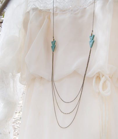 ChevronTurquoise Multi Chain Brass Necklace. Crackled arrow and pyrite beads.