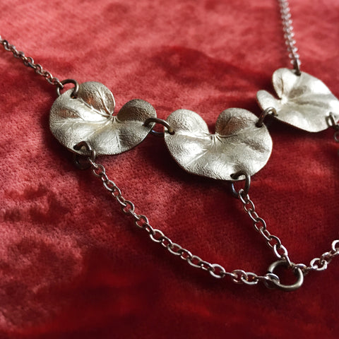 Triple Lily Pad Necklace with swooping gold chain
