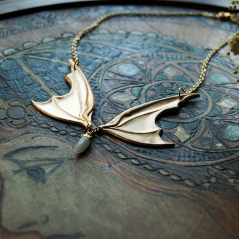 Vampire Lestat Bat Wing Necklace with Moonstone Spike on gold chain