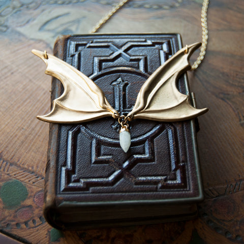 Vampire Lestat Bat Wing Necklace with Moonstone Spike on gold chain